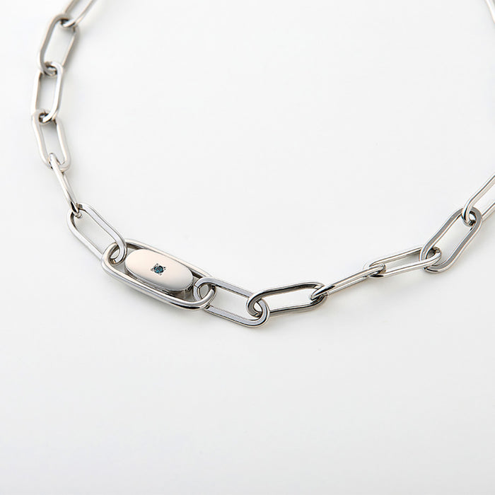 Close-up of the PhitenSG Clip Chain Bracelet’s elegant chain links, showcasing its polished finish and unique clip design.