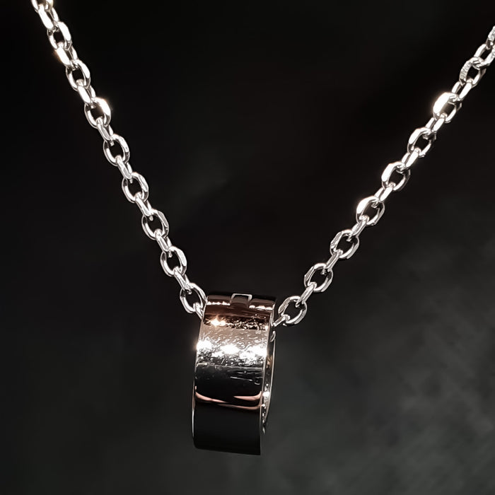 PhitenSG Ring Holder Necklace in silver, showcasing its sleek design and ring-holding feature