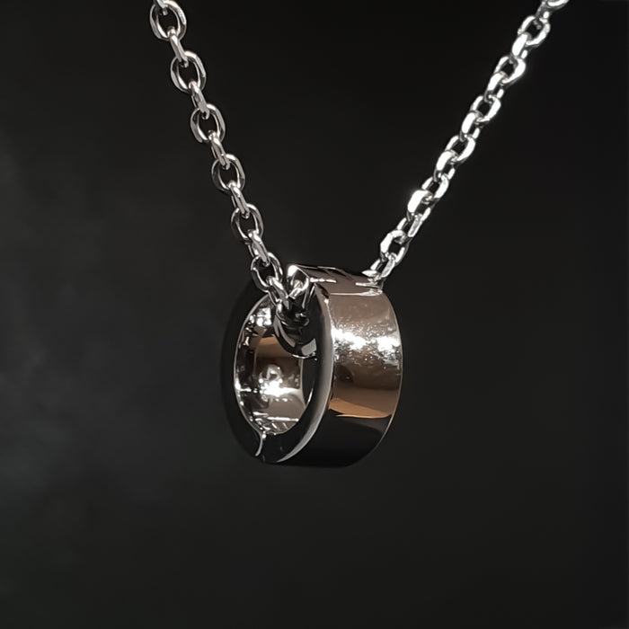 PhitenSG Ring Holder Necklace in silver, showcasing its sleek design and ring-holding feature