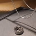 PhitenSG Ring Holder Necklace in silver, showcasing its sleek design and ring-holding feature