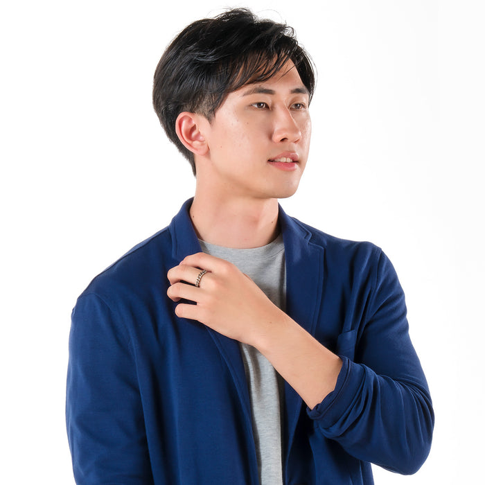 Phiten Titanium Kihei Ring worn as a statement accessory, blending style with durability.